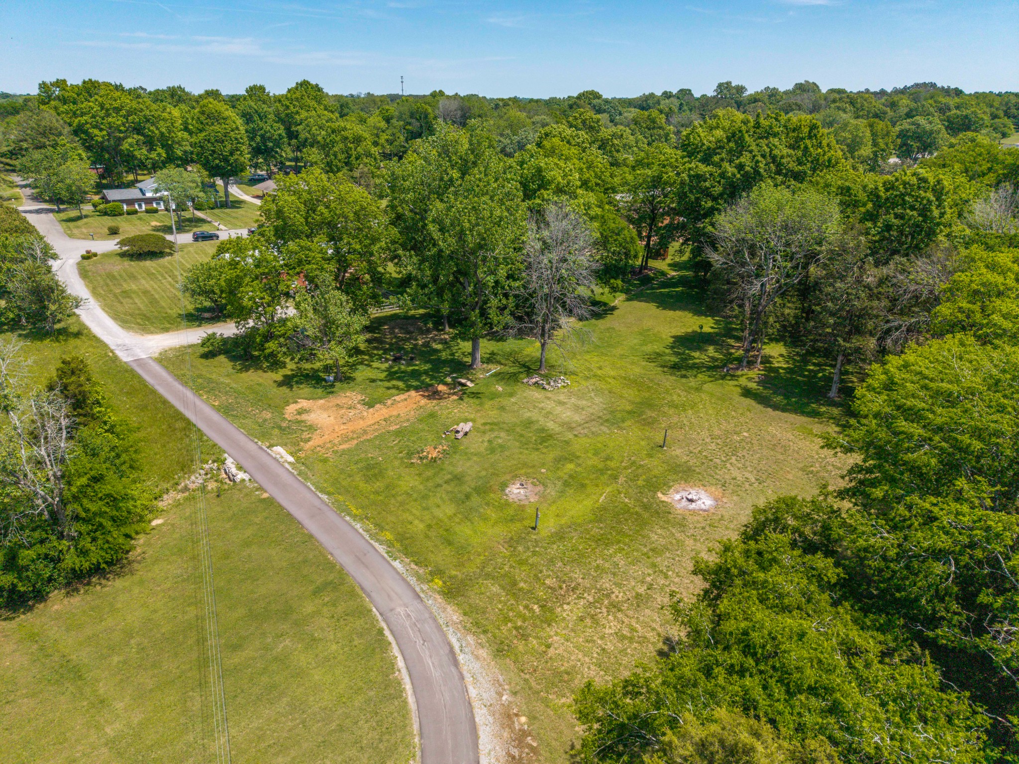 817 Fredricksburg Road Mount Juliet, TN 37122 - Photo 54 of 56 a view of a lake in a forest