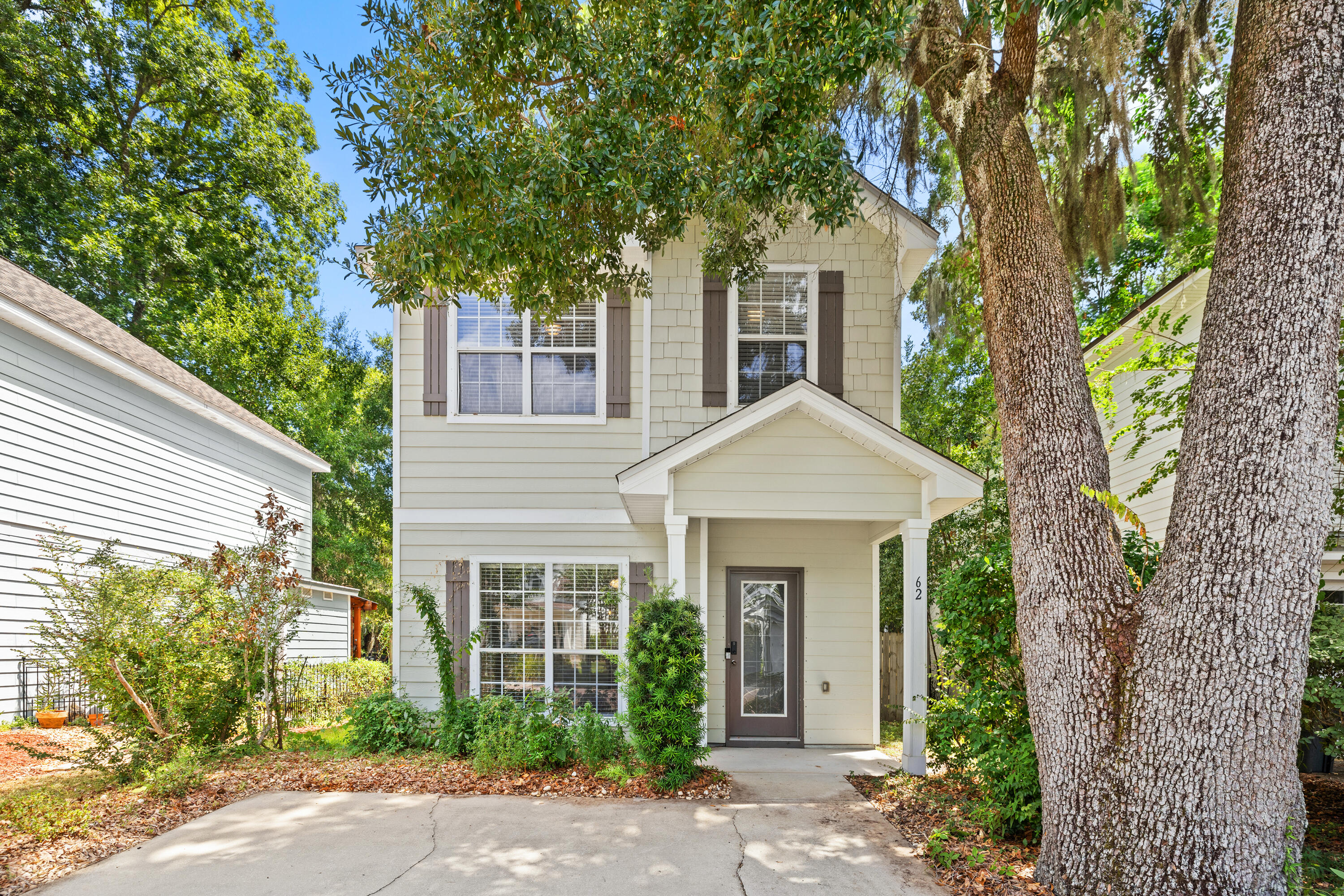 62 Beacon Point Drive Santa Rosa Beach, FL 32459 - Photo 1 of 51 front view of a house with a garden