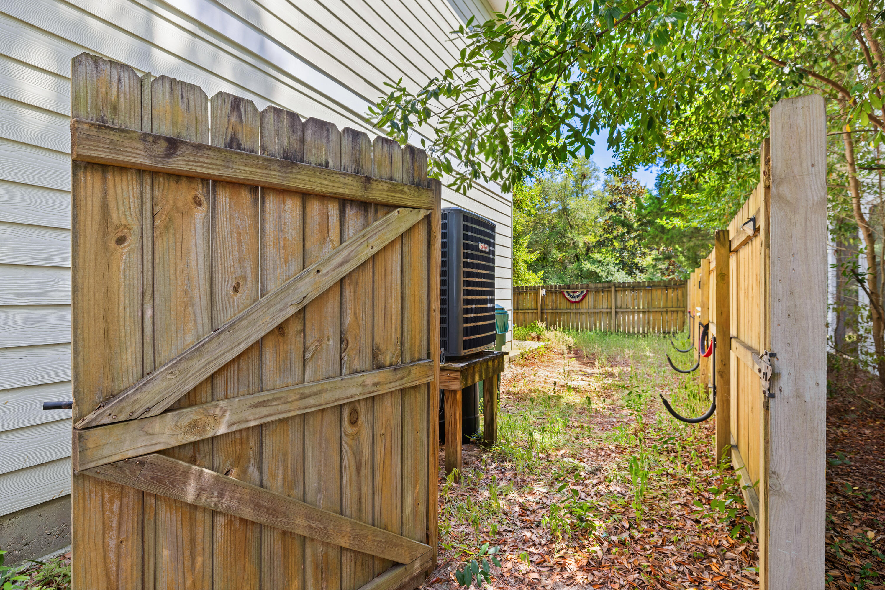62 Beacon Point Drive Santa Rosa Beach, FL 32459 - Photo 19 of 51 a view of a pathway of a house with wooden floor