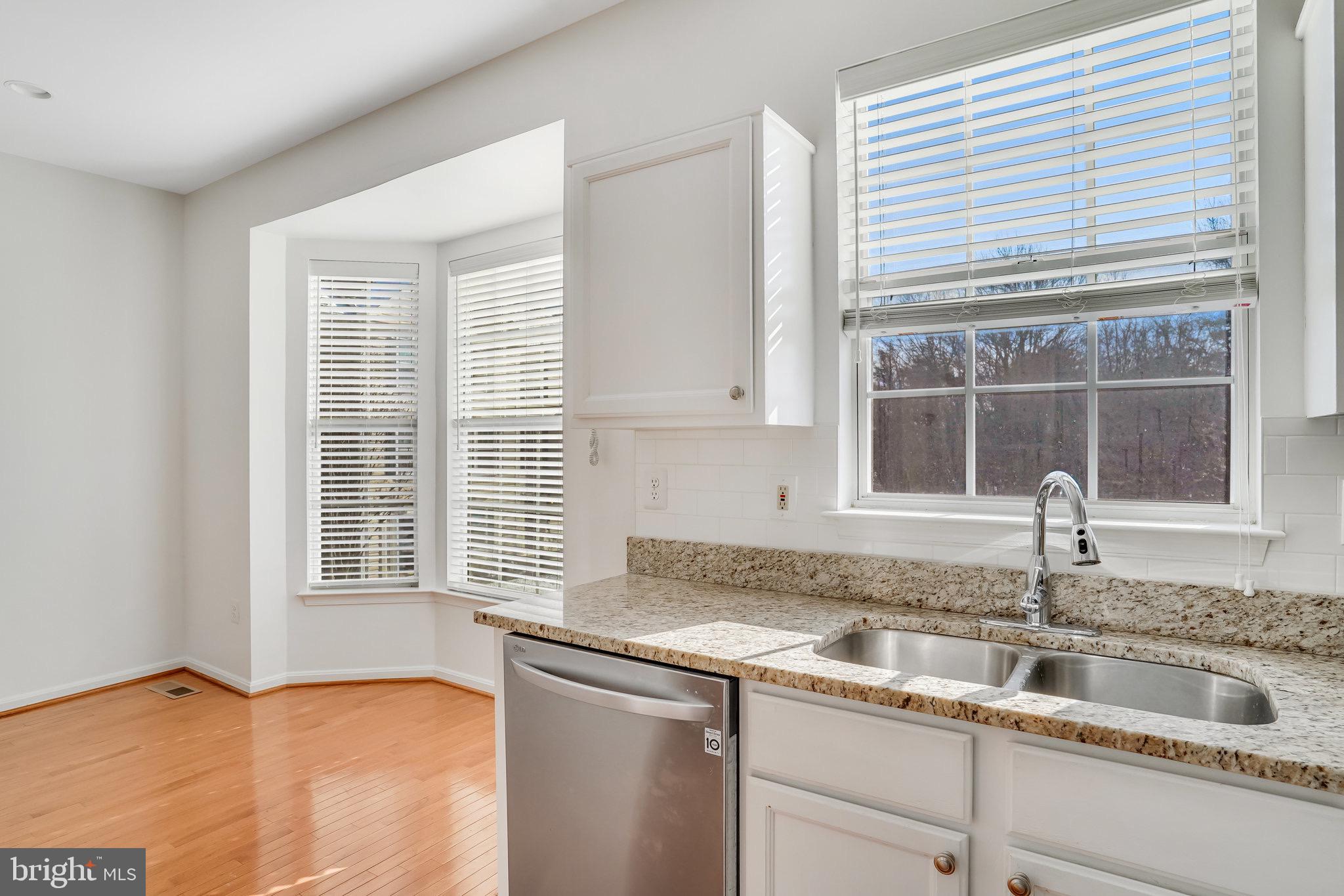 6324 Dakine Circle Springfield, VA 22150 - Photo 15 of 25 a kitchen with a sink and a window