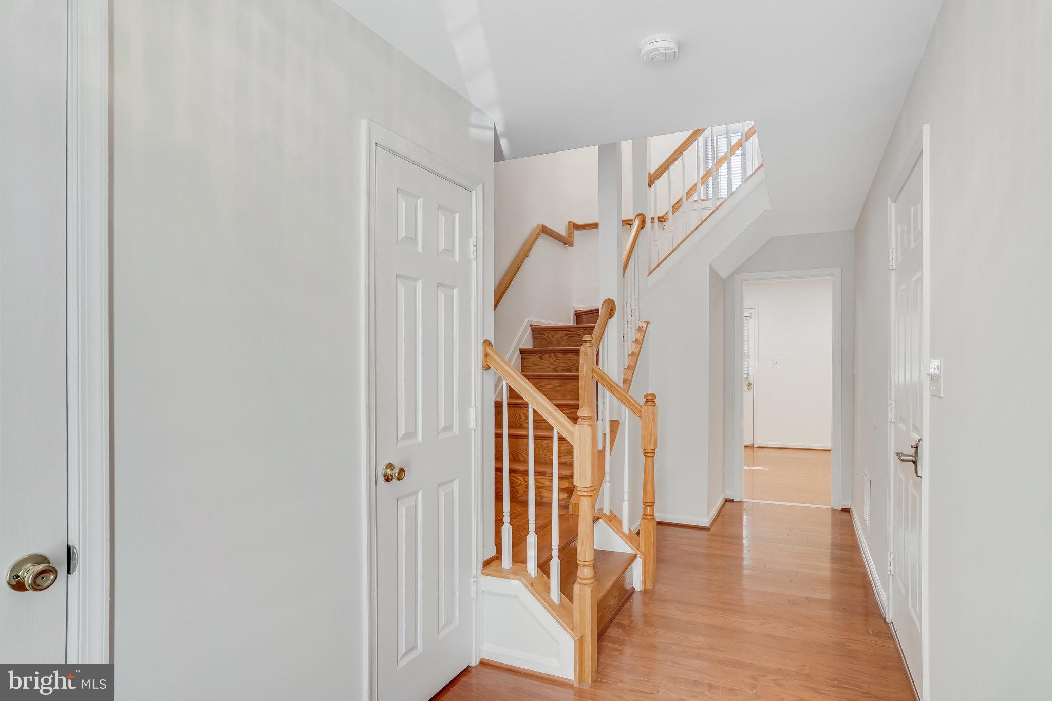 6324 Dakine Circle Springfield, VA 22150 - Photo 2 of 25 a view of a hallway with staircase
