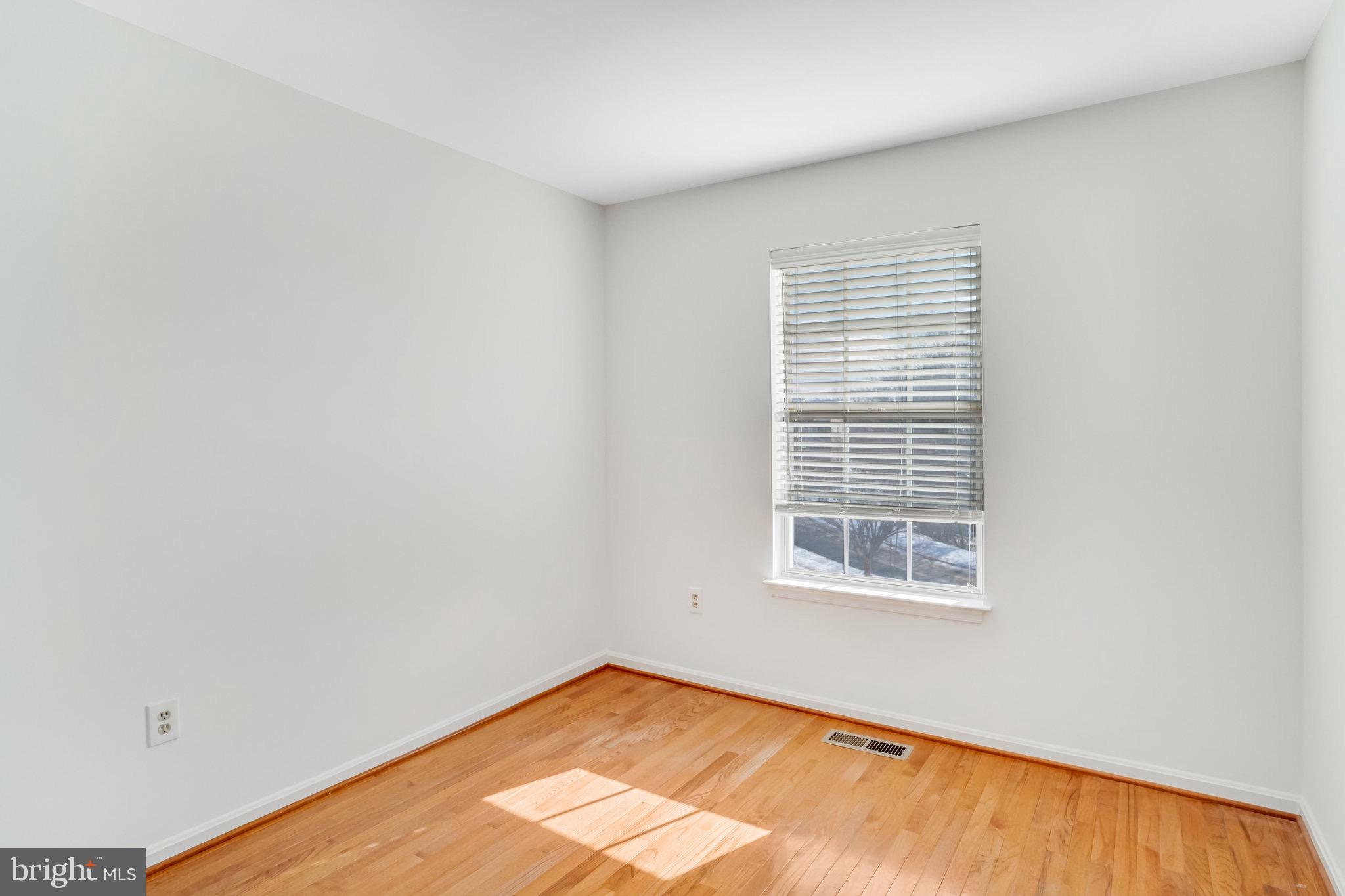 6324 Dakine Circle Springfield, VA 22150 - Photo 23 of 25 a view of an empty room with a window