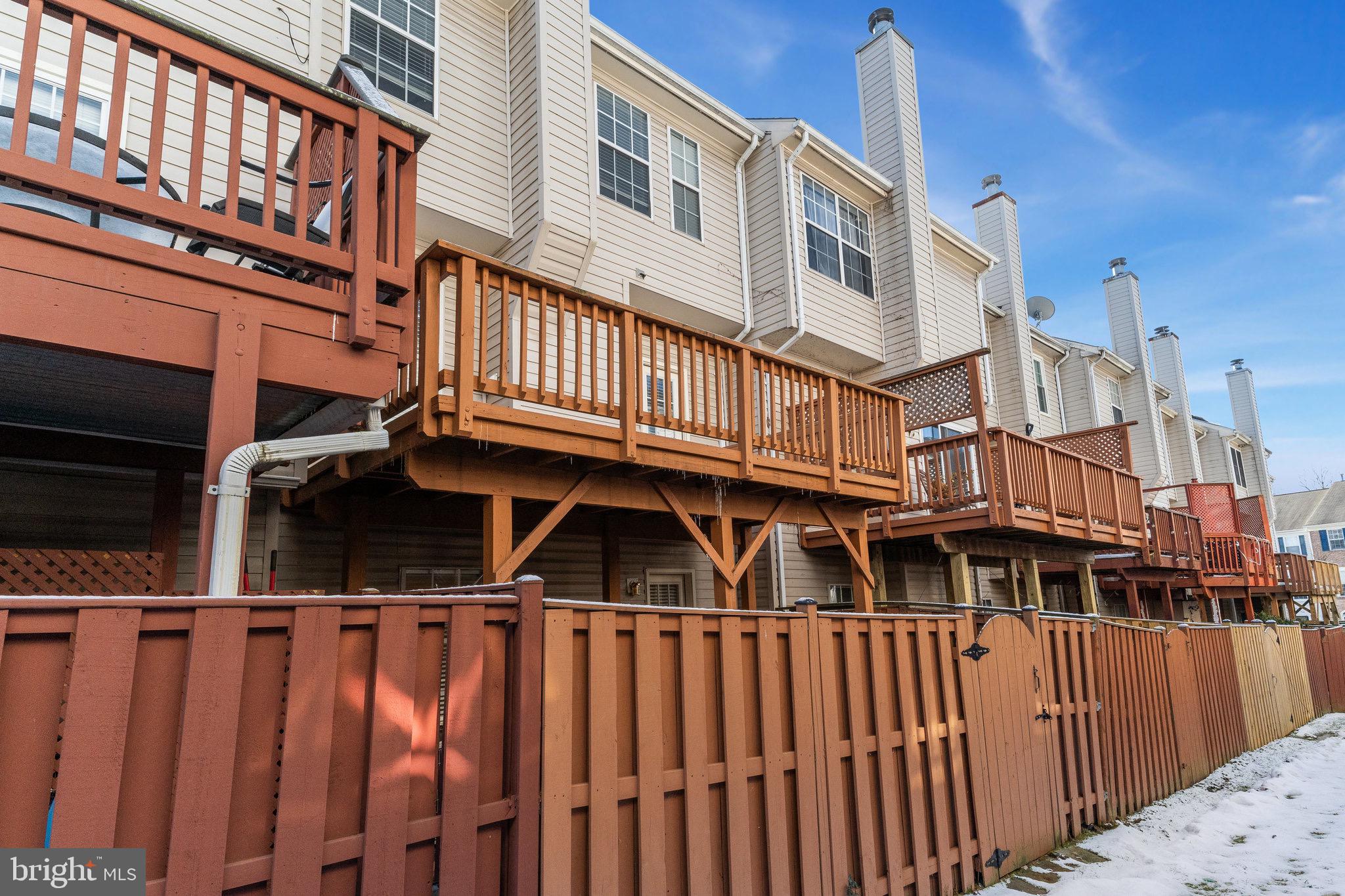 6324 Dakine Circle Springfield, VA 22150 - Photo 25 of 25 a view of a house with wooden fence