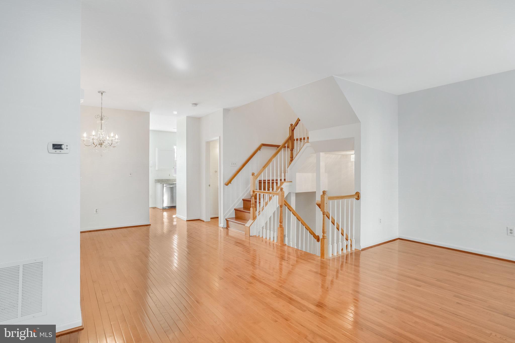 6324 Dakine Circle Springfield, VA 22150 - Photo 8 of 25 a view of an entryway with wooden floor