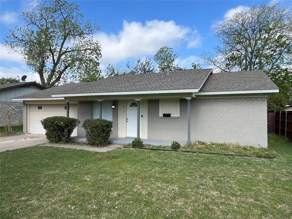 1413 Ridgecrest Drive Plano, TX 75074 - Photo 3 of 22 Single story home with brick siding, an attached garage, roof with shingles, and covered porch