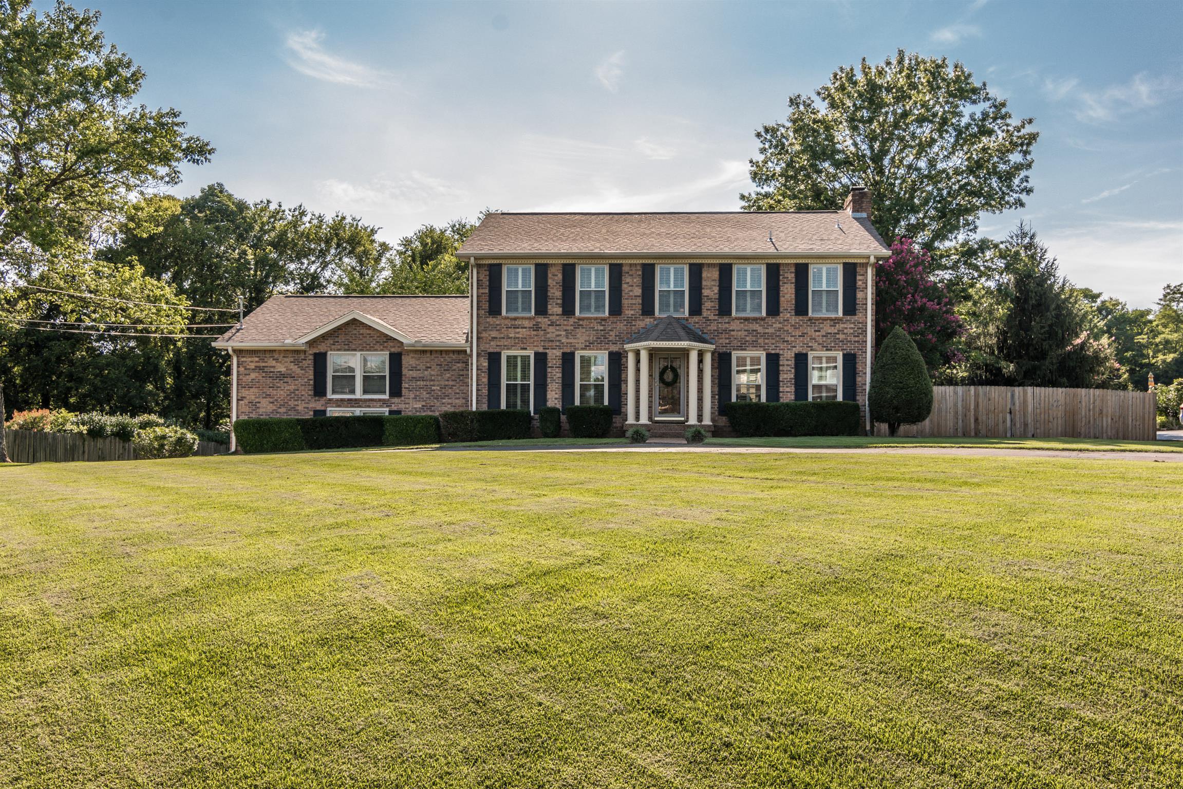 a front view of house with an ocean view