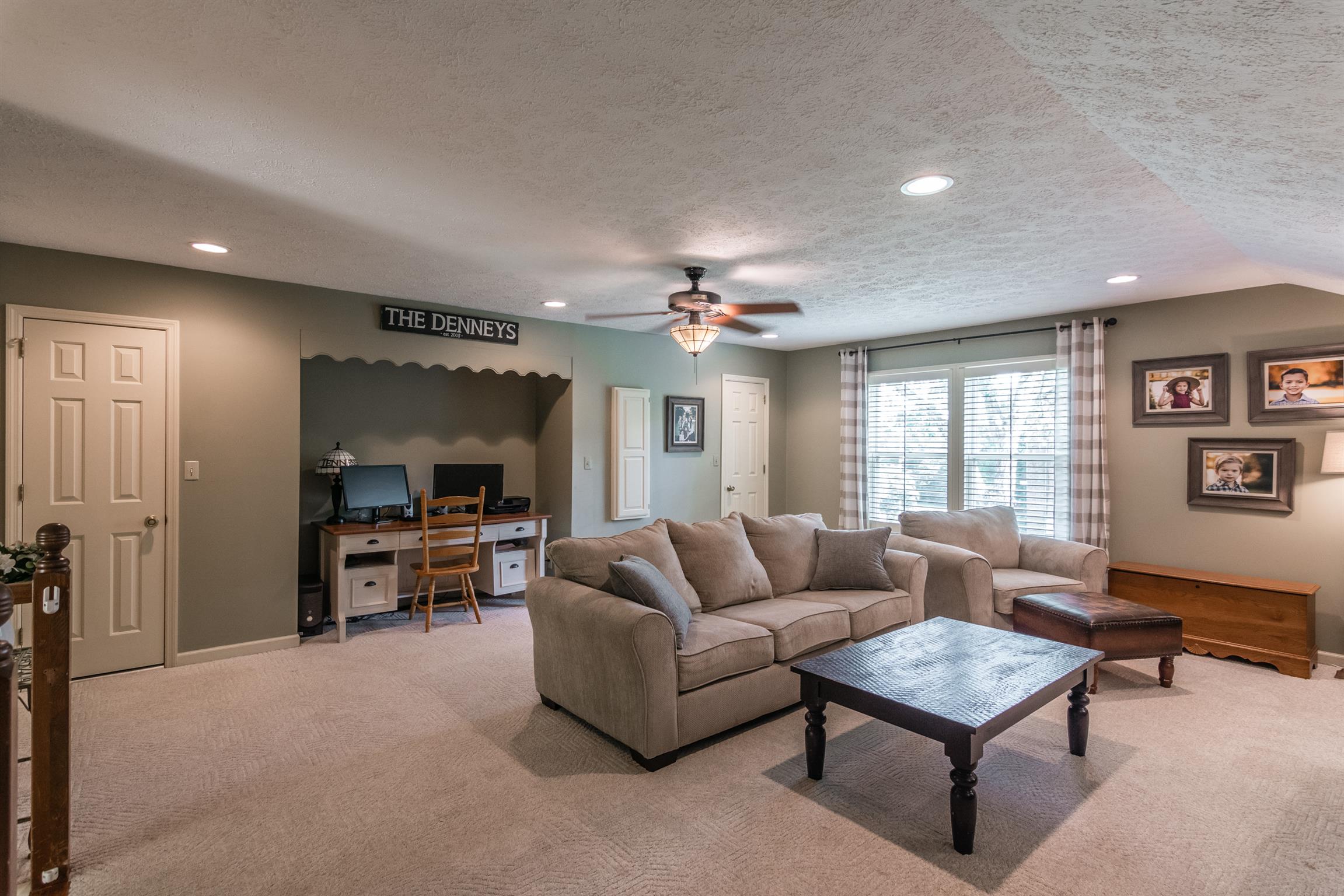 103 Crosspointe Hendersonville, TN 37075 - Photo 14 of 30 a living room with furniture and a chandelier