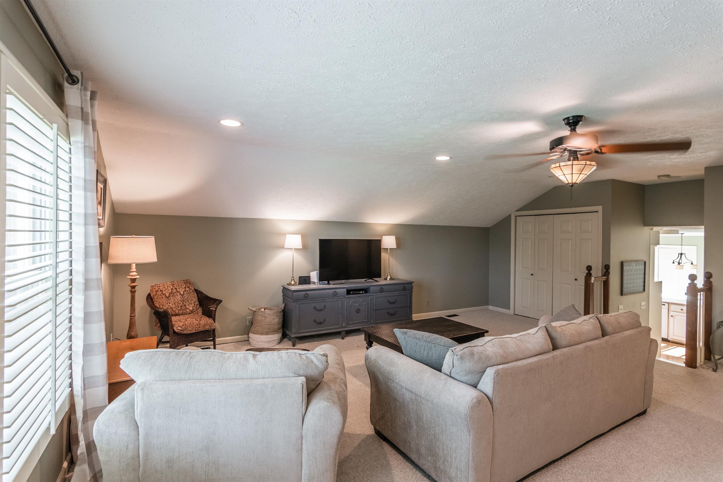 103 Crosspointe Hendersonville, TN 37075 - Photo 15 of 30 a living room with furniture and a flat screen tv