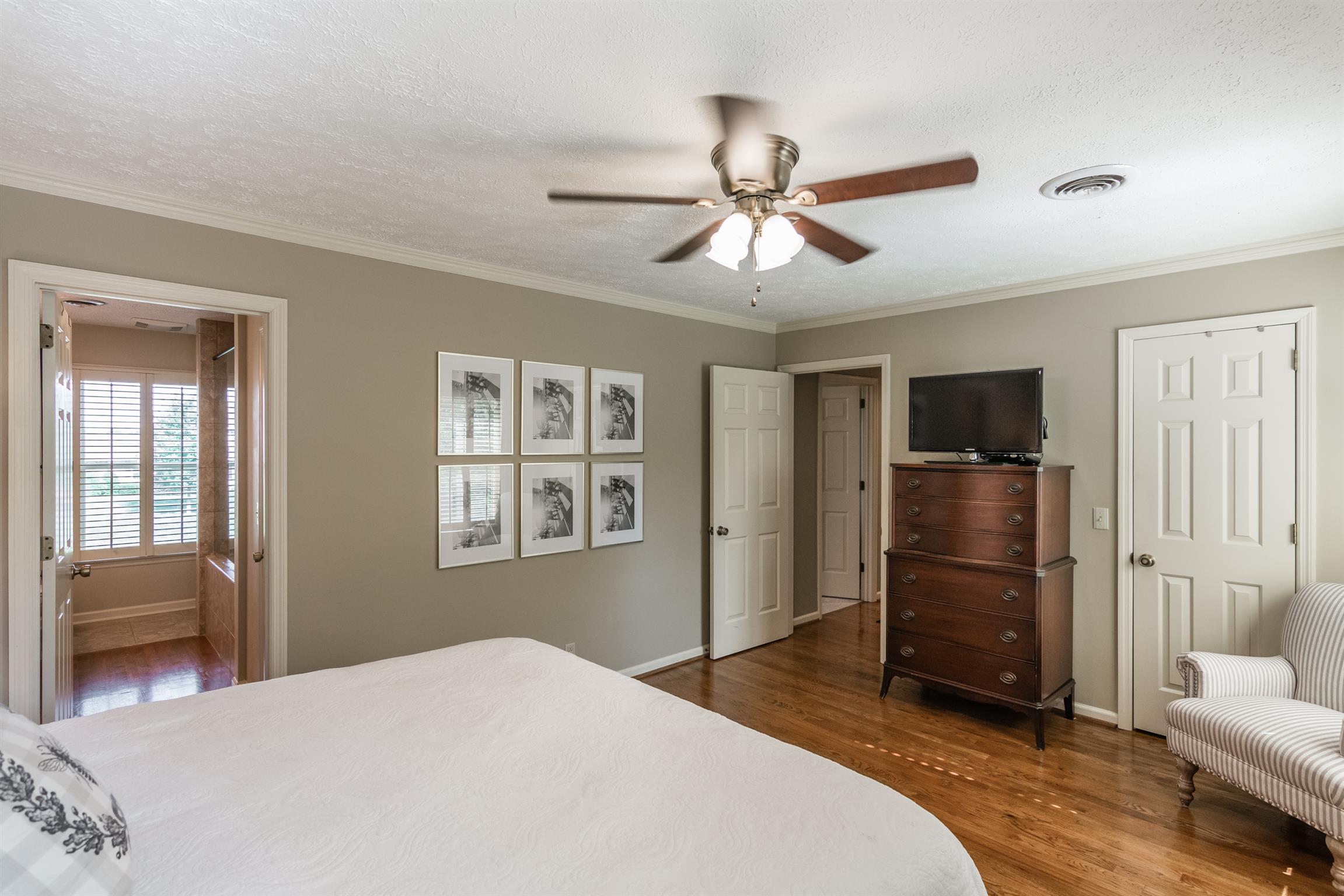 103 Crosspointe Hendersonville, TN 37075 - Photo 17 of 30 a bedroom with a bed dresser and a window