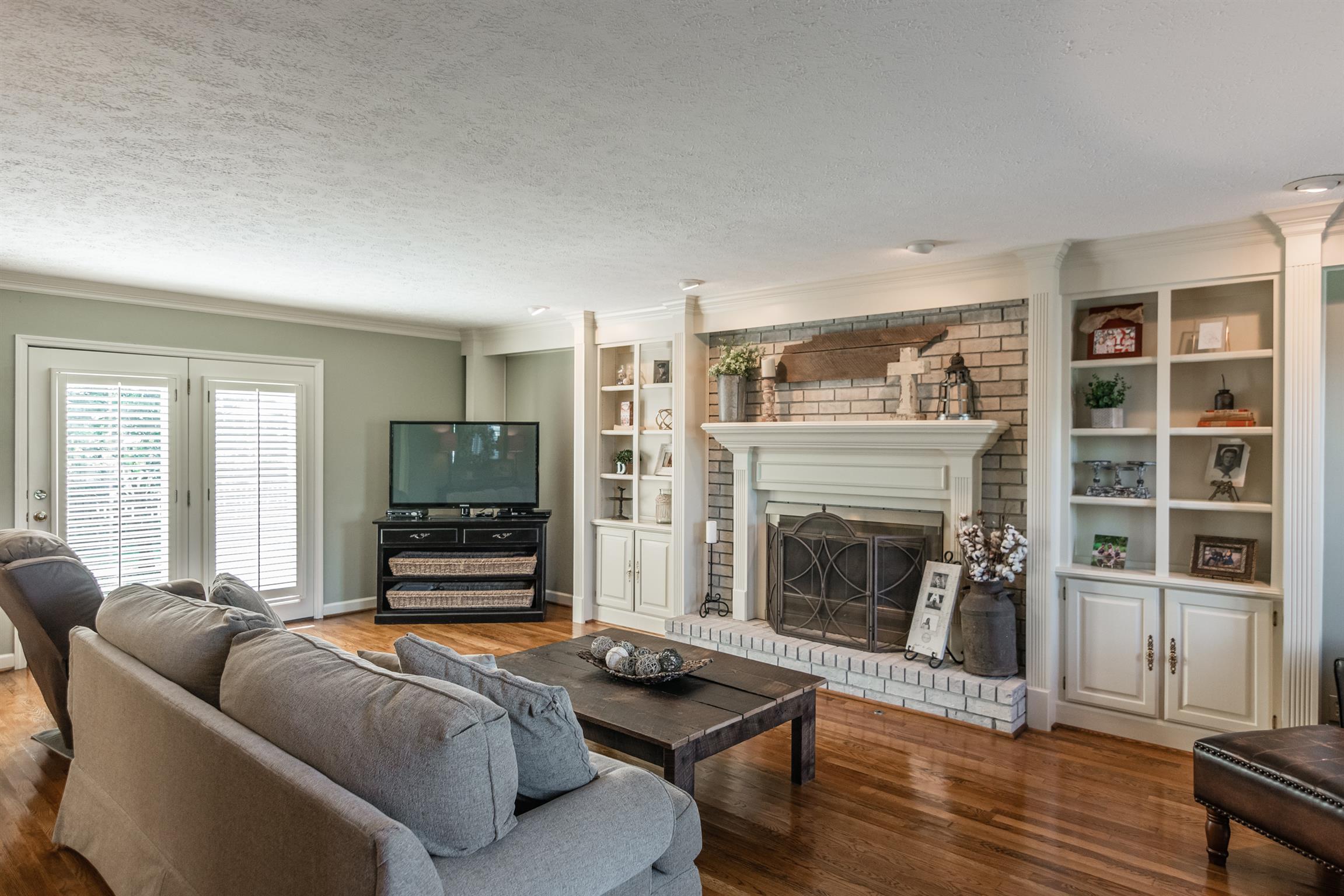 103 Crosspointe Hendersonville, TN 37075 - Photo 3 of 30 a living room with furniture and a fireplace