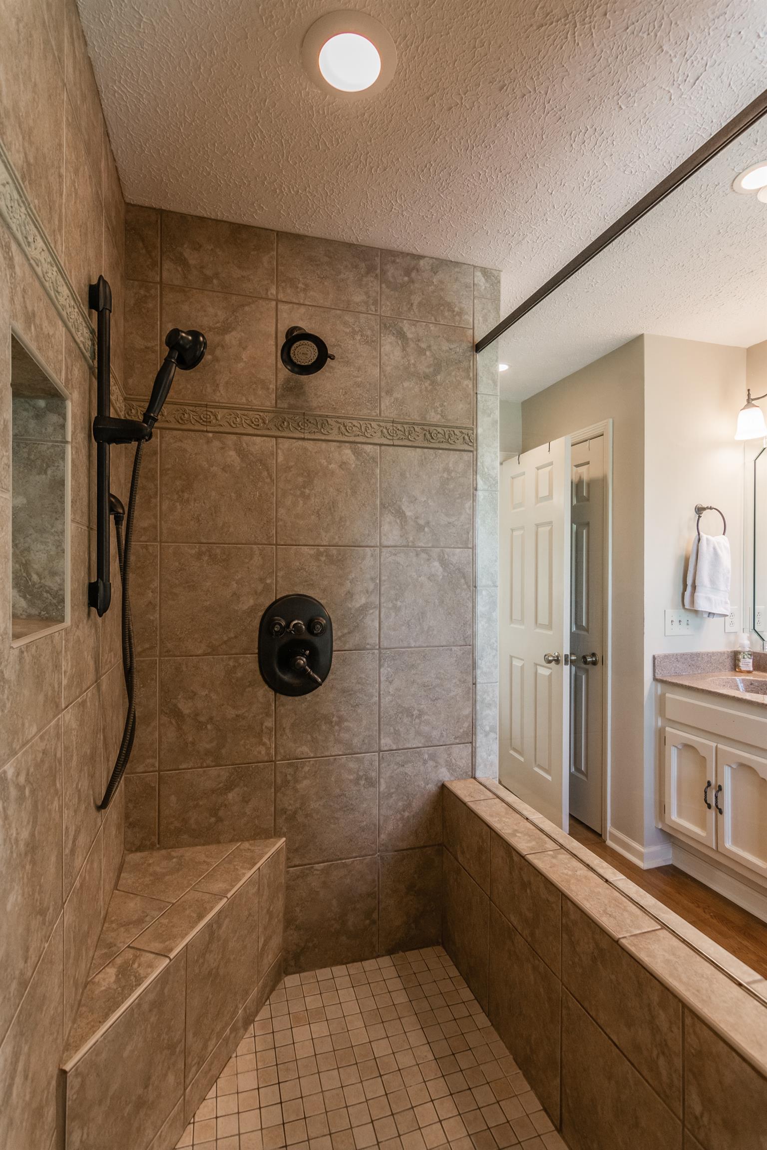 103 Crosspointe Hendersonville, TN 37075 - Photo 21 of 30 a bathroom with a sink a toilet and shower