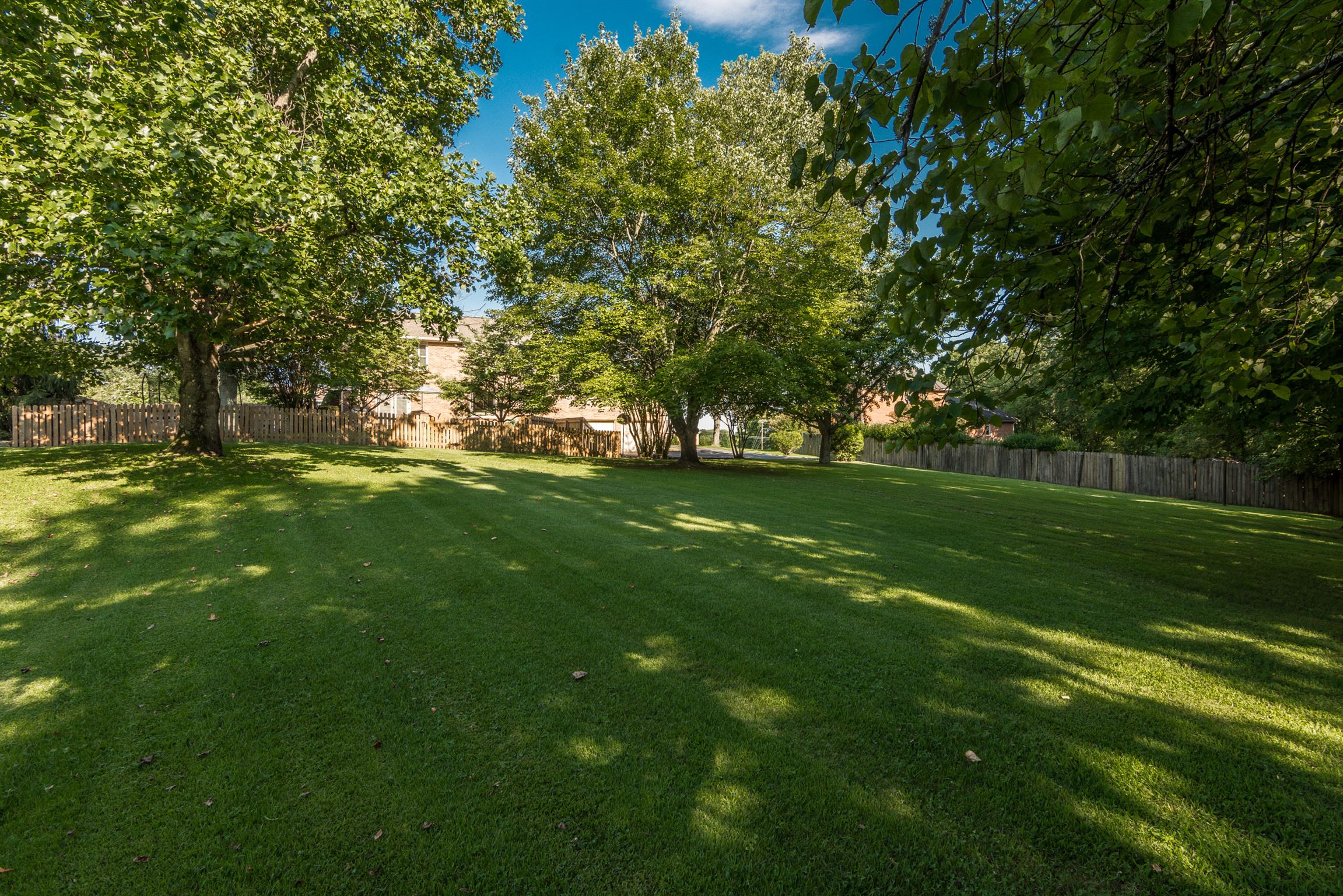 103 Crosspointe Hendersonville, TN 37075 - Photo 26 of 30 a view of a grassy field with trees