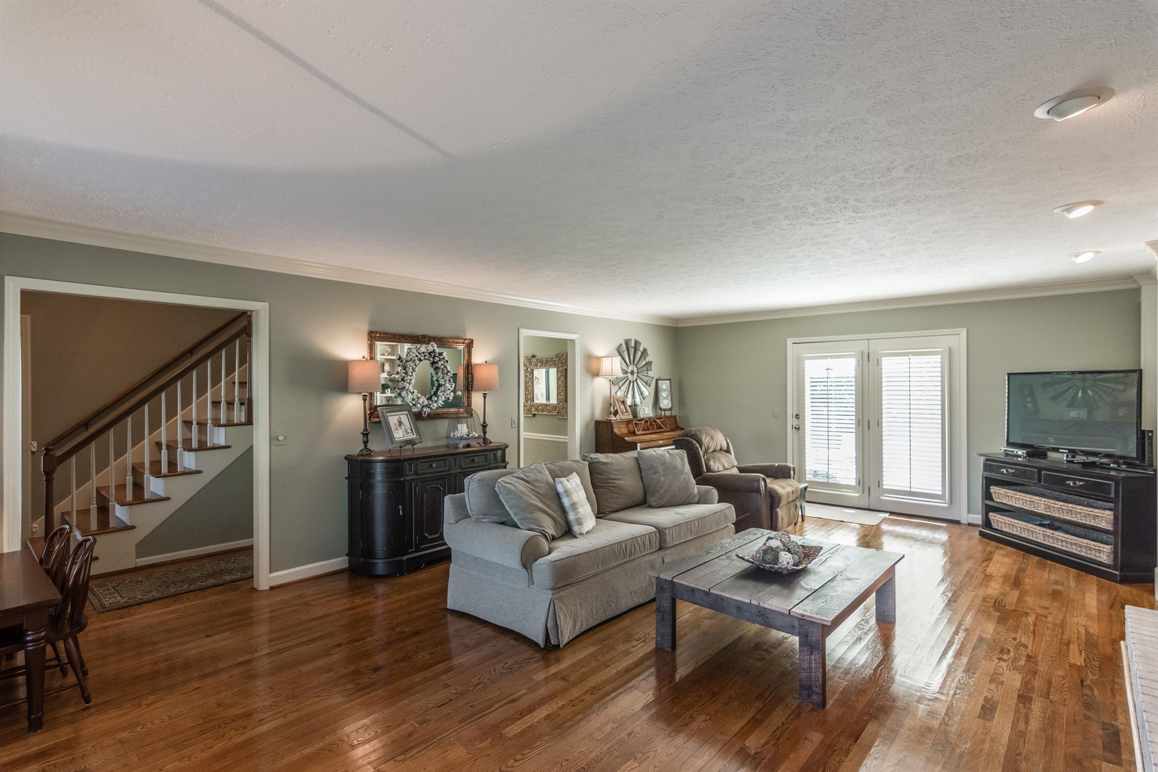 103 Crosspointe Hendersonville, TN 37075 - Photo 5 of 30 a living room with furniture and a flat screen tv