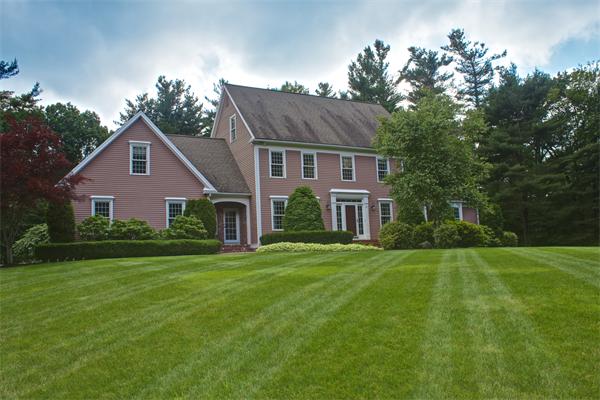 31 Sibley Road Sutton, MA 01590 - Photo 1 of 1 a front view of a house with a yard and trees