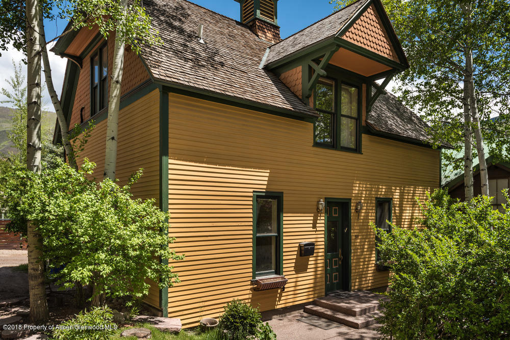 314 West Main Street Aspen, CO 81611 - Photo 16 of 20 a house that has a tree in front of the house