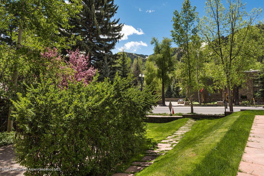 314 West Main Street Aspen, CO 81611 - Photo 17 of 20 a view of a house with swimming pool and sitting area