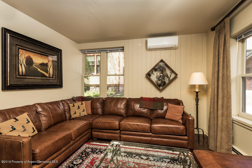 314 West Main Street Aspen, CO 81611 - Photo 7 of 20 a living room with furniture and a window