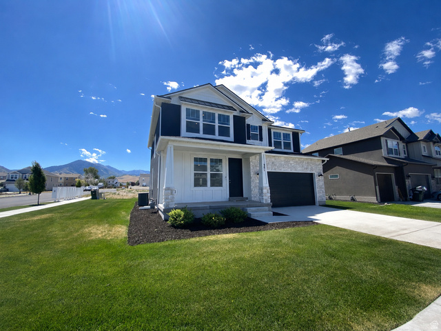 341 Quartz Road, Unit 8037 Tooele, UT 84074 - Photo 2 of 10 This picture has been aI edited to remove the Model Home sign.