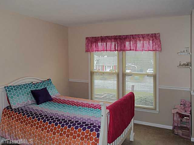 1708 Bolingbroke Road High Point, NC 27265 - Photo 12 of 16 3rd Bedroom. The third bedroom has a great closet with a custom organizer in it.