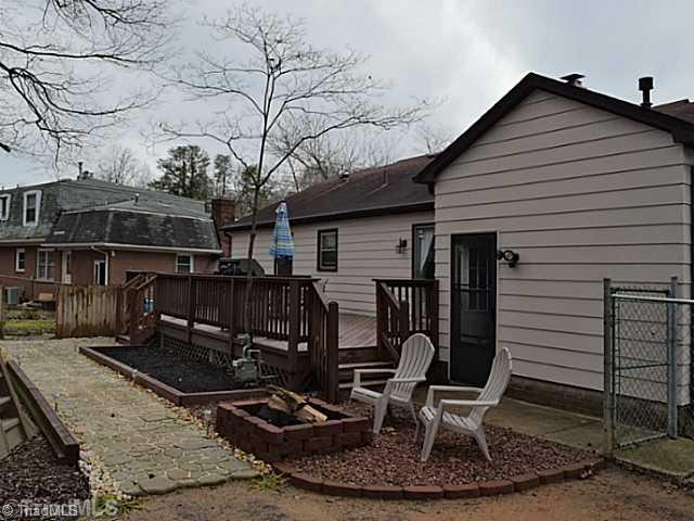 1708 Bolingbroke Road High Point, NC 27265 - Photo 13 of 16 Exterior Back. Back view shows off the deck and its attractive walkway.