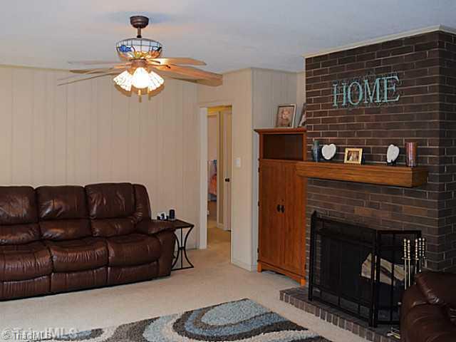 1708 Bolingbroke Road High Point, NC 27265 - Photo 4 of 16 Den/Family/Great Room. This inviting den enjoys the warmth of a masonry fireplace.