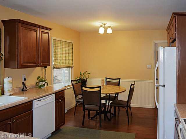1708 Bolingbroke Road High Point, NC 27265 - Photo 8 of 16 Kitchen. This big eat-in kitchen has a very comfortable informal dining area. The homes full laundry is behind the kitchen.
