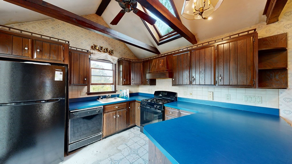 41 Echo Avenue Beverly, MA 01915 - Photo 14 of 24 a kitchen with stainless steel appliances granite countertop a sink stove and refrigerator