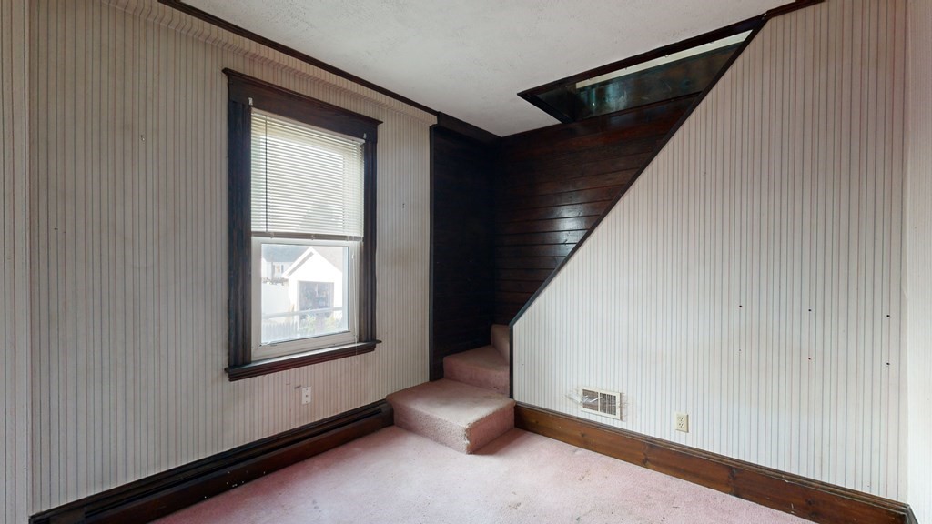 41 Echo Avenue Beverly, MA 01915 - Photo 17 of 24 a view of an empty room and window