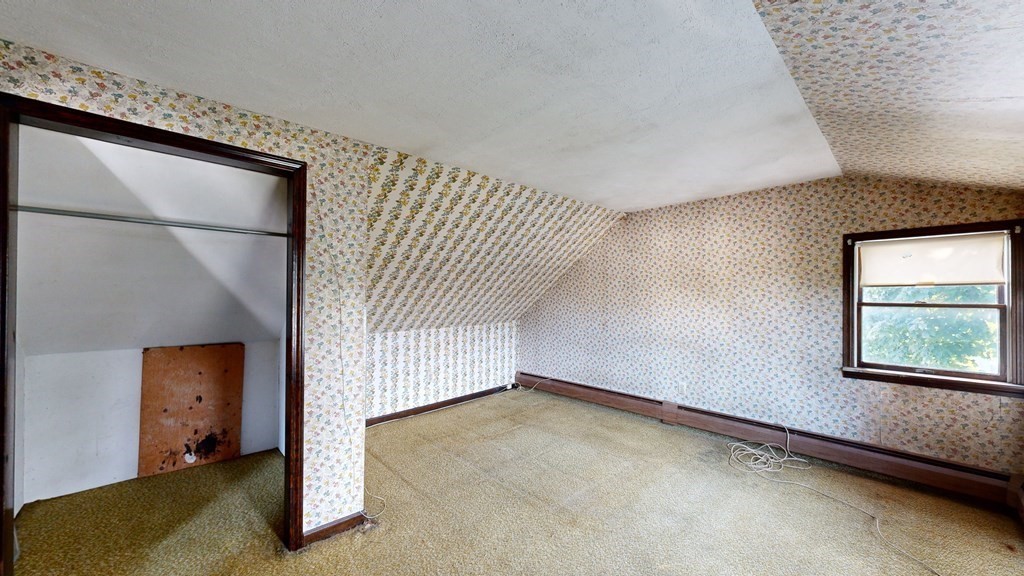 41 Echo Avenue Beverly, MA 01915 - Photo 19 of 24 a view of an empty room with a window