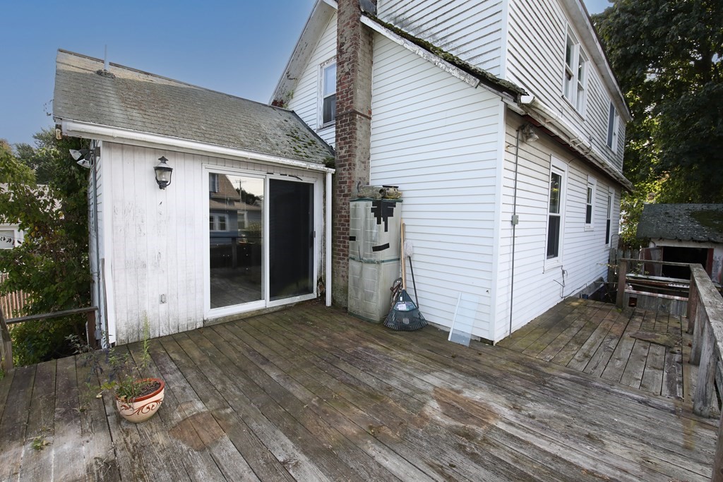 41 Echo Avenue Beverly, MA 01915 - Photo 4 of 24 a view of a house with a yard