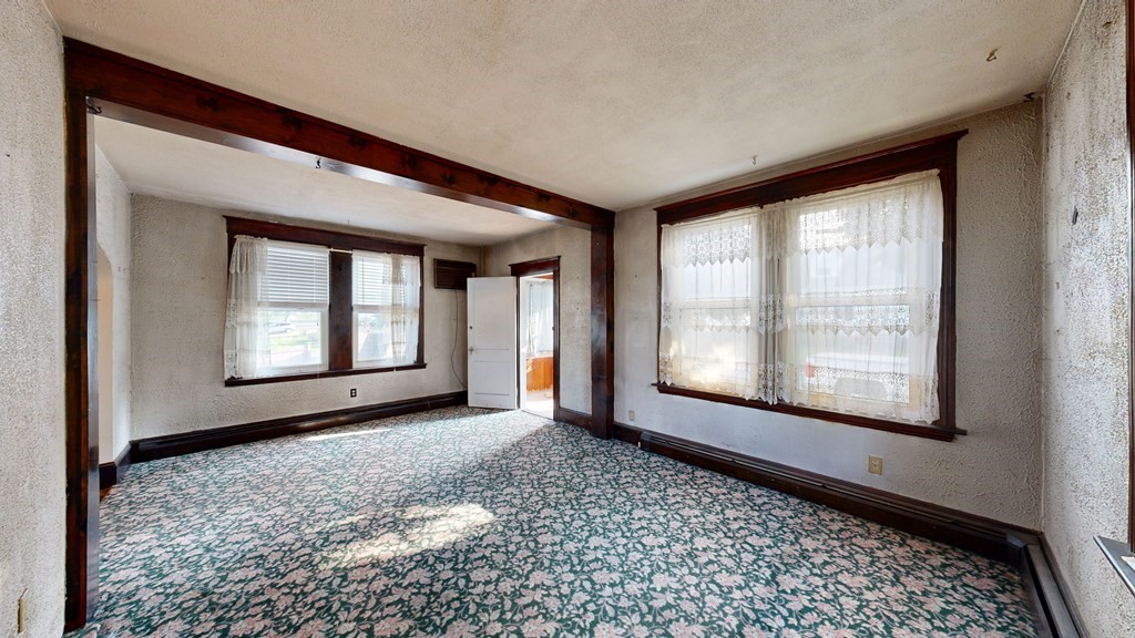 41 Echo Avenue Beverly, MA 01915 - Photo 10 of 24 a view of an empty room with a window