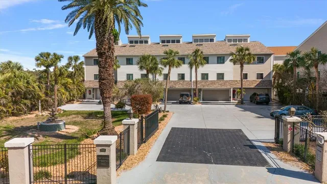 a view of multiple houses with outdoor space