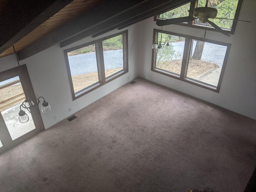 12877 Bobs Mountain Road Redding, CA 96003 - Photo 13 of 51 an empty room with windows