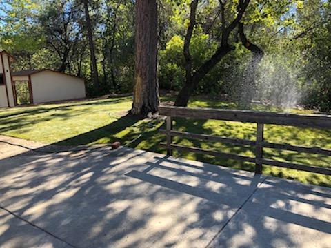 12877 Bobs Mountain Road Redding, CA 96003 - Photo 51 of 51 a view of a yard with swimming pool