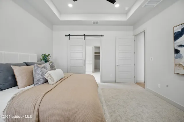 a bedroom with a bed and closet
