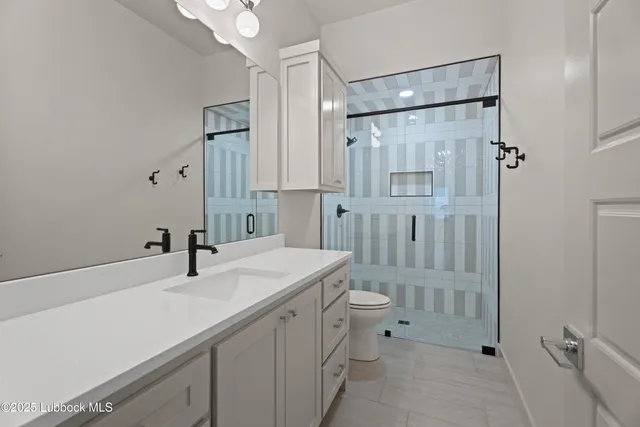 a view of cabinets with wooden floor