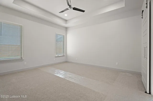a view of balcony with wooden floor