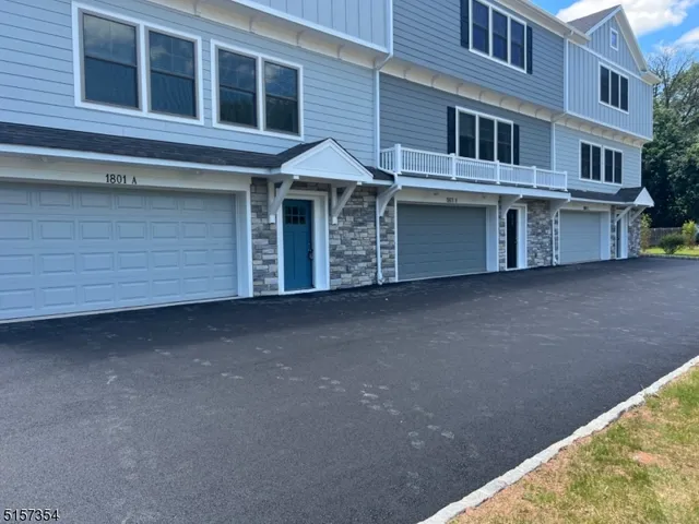 a view of a house with a street