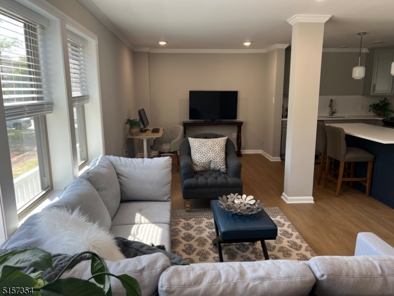 1801 Front Street, Unit A Scotch Plains, NJ 07076 - Photo 7 of 31 a living room with furniture and a flat screen tv