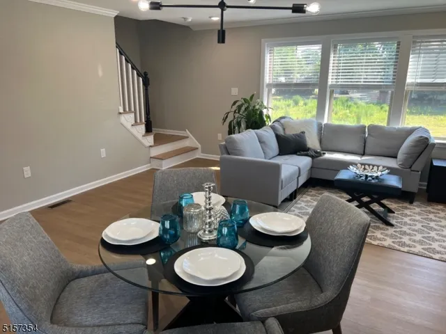 a living room with furniture and a table