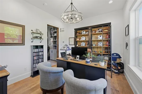 a workspace with furniture and window