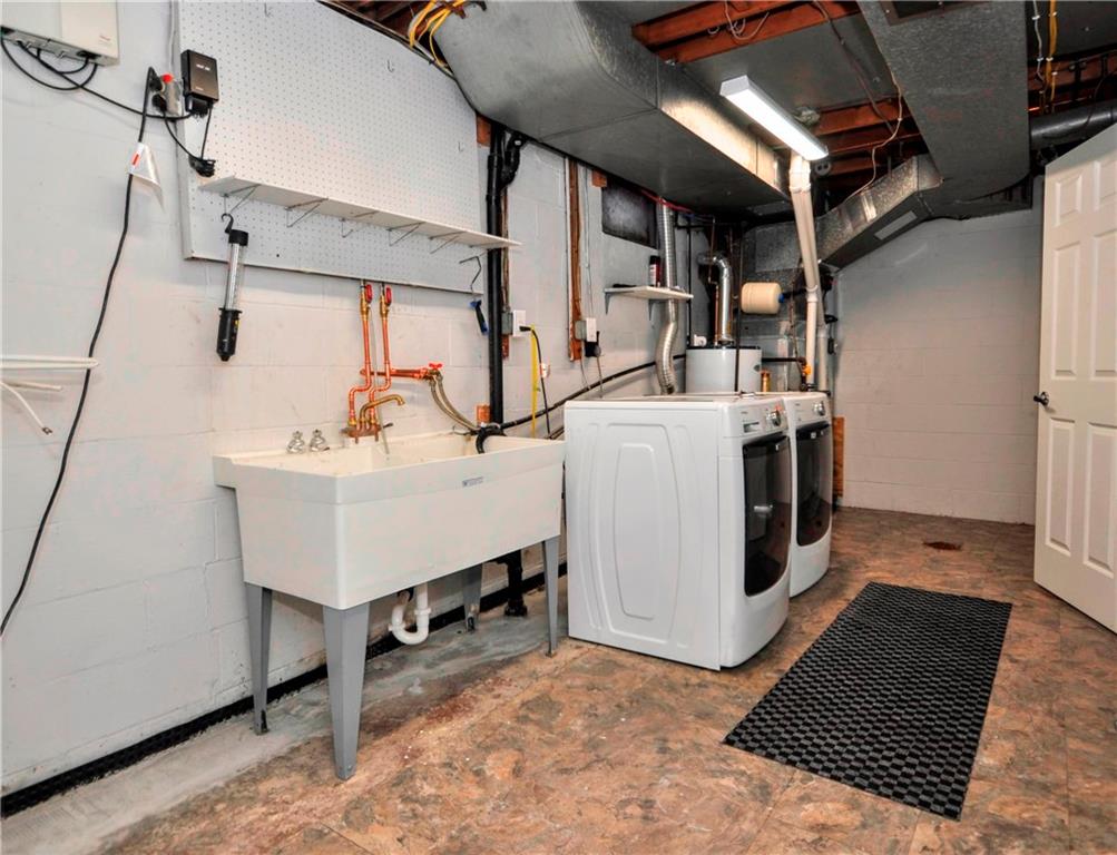 1313 Star Ridge Drive Pittsburgh, PA 15241 - Photo 33 of 36 a utility room with dryer and washer