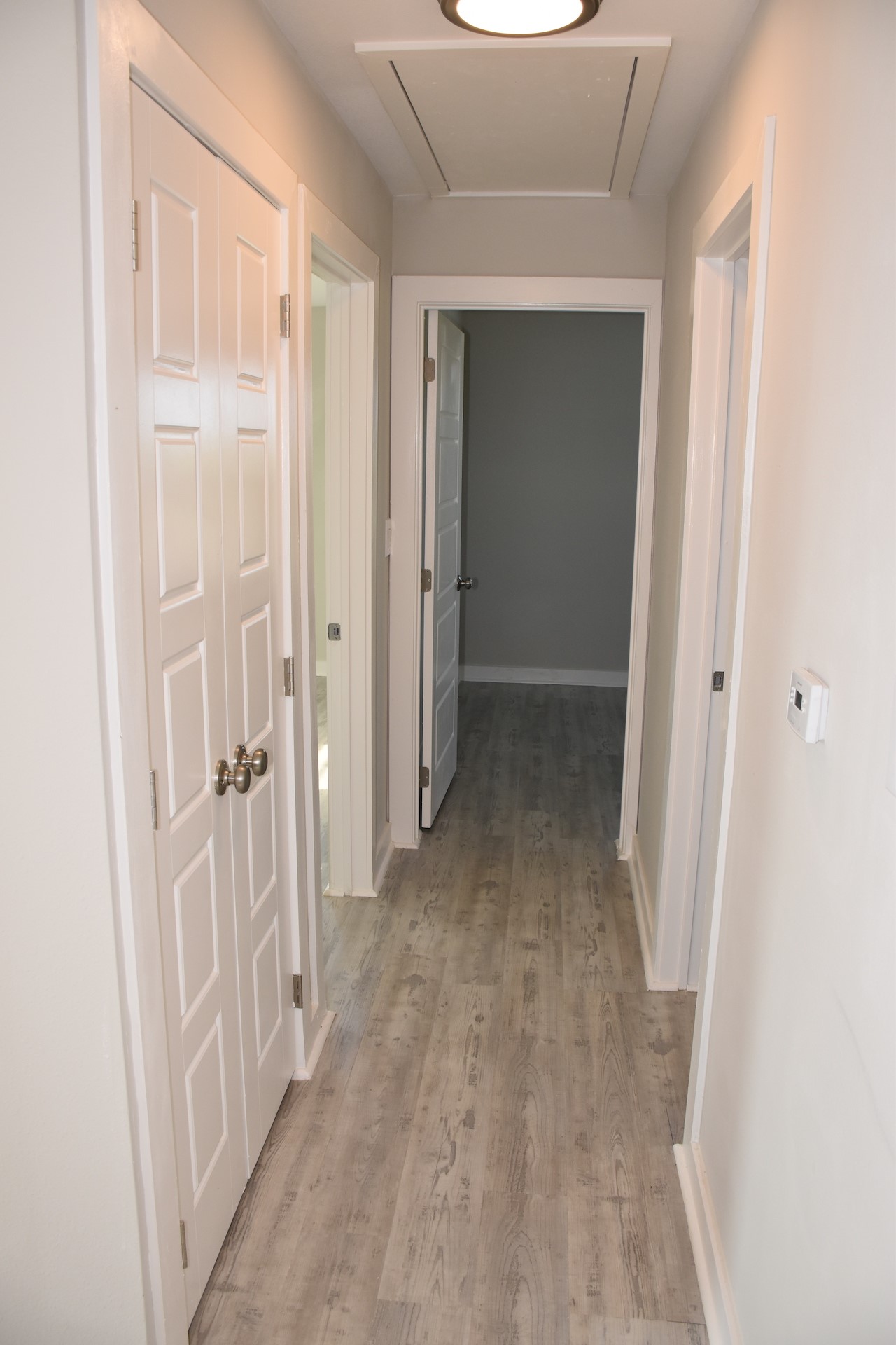 3751 County Road 463 Elgin, TX 78621 - Photo 16 of 27 a view of a hallway with wooden floor