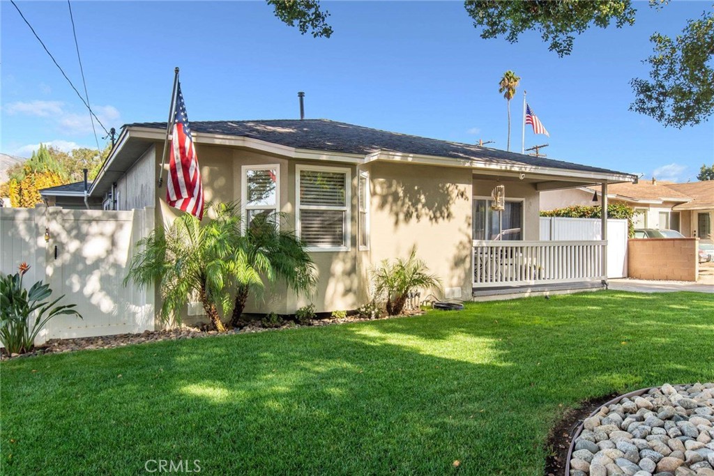 749 East Baseline Road San Dimas, CA 91773 - Photo 4 of 35 a front view of a house with a yard
