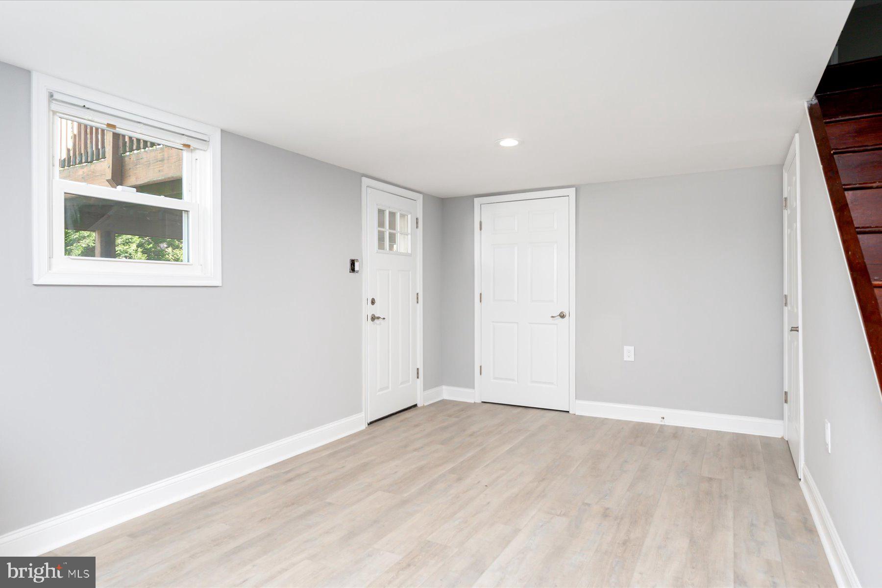 401 Heitzman Road Davidsonville, MD 21035 - Photo 23 of 32 Walkout basement & door to storage area