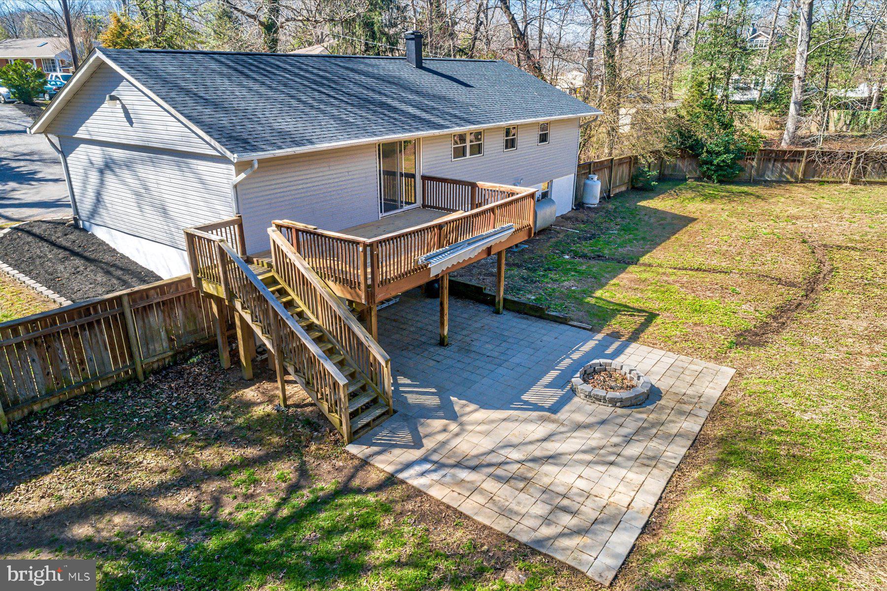 401 Heitzman Road Davidsonville, MD 21035 - Photo 24 of 32 Back Yard - Deck and Firepit area