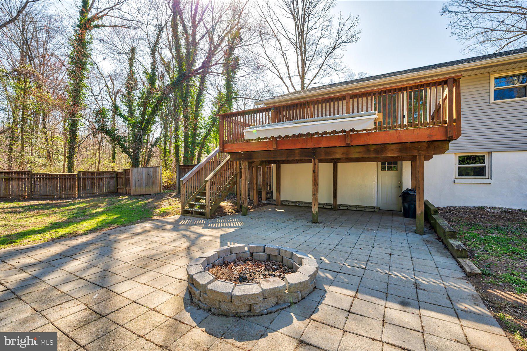 401 Heitzman Road Davidsonville, MD 21035 - Photo 25 of 32 Back Yard - Deck and Firepit area