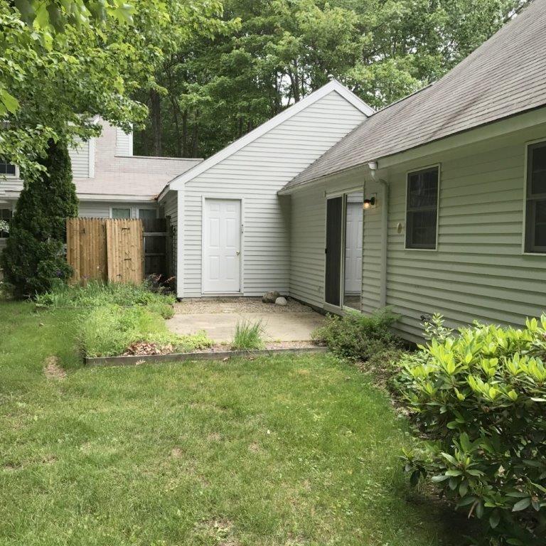 Unit #56 Willow Grove Road, Unit 56 Brunswick, ME 04011 - Photo 24 of 27 Longer view of patio area.