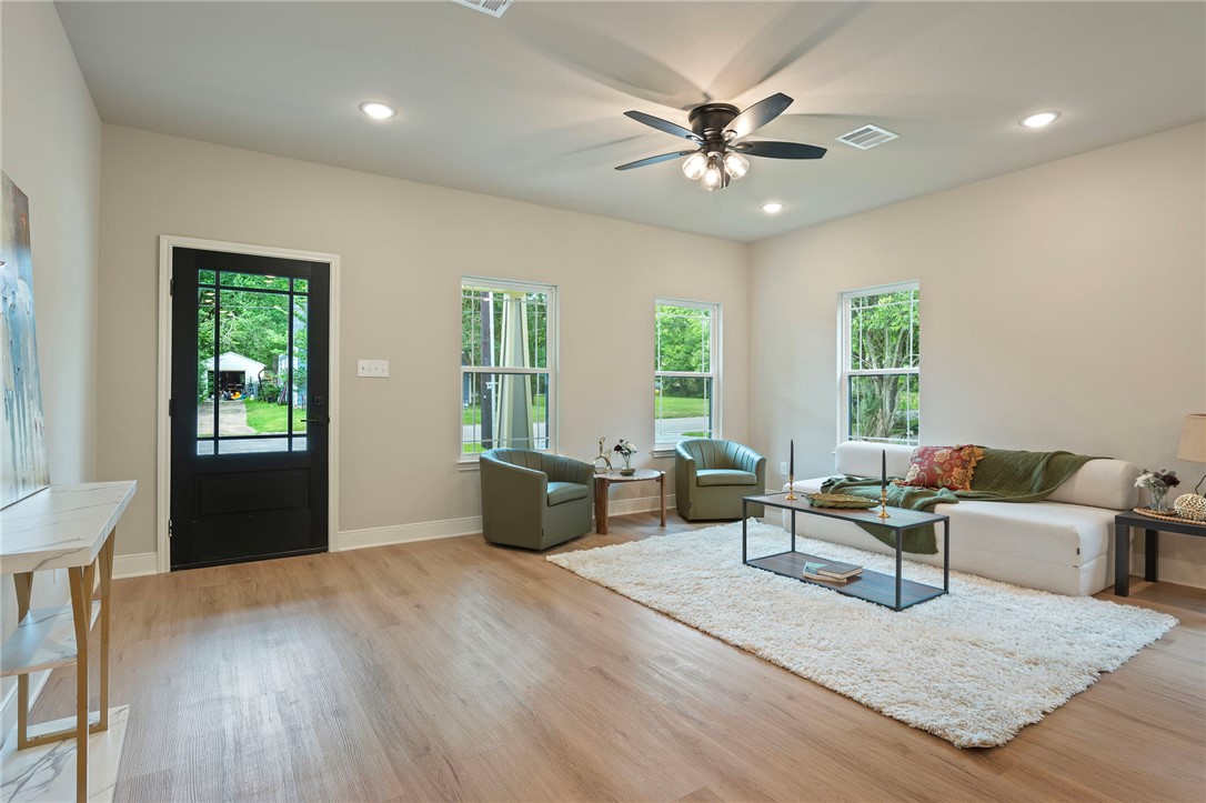 804 East 27th Street Bryan, TX 77803 - Photo 3 of 21 a living room with furniture and window