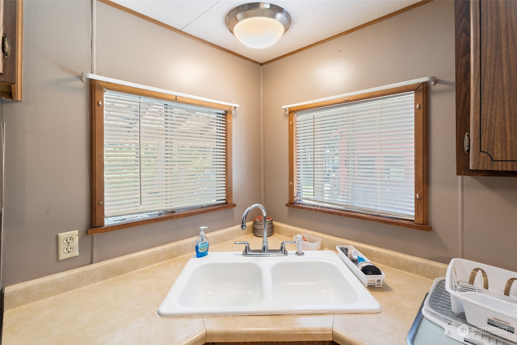 17210 Entiat River Road Entiat, WA 98822 - Photo 16 of 37 a bathroom with a tub sink and a window